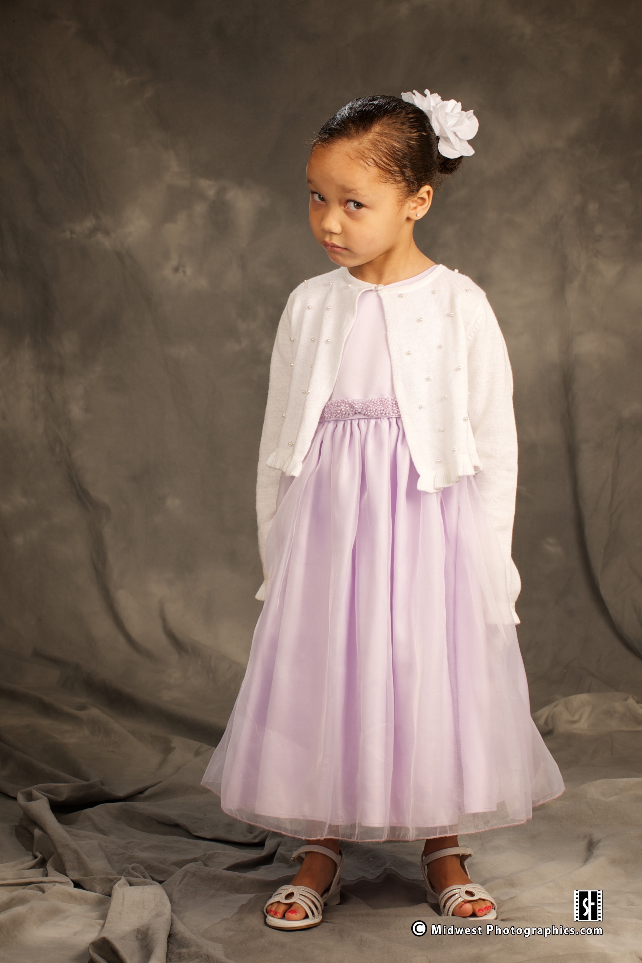 Child portrait in a lavender dress